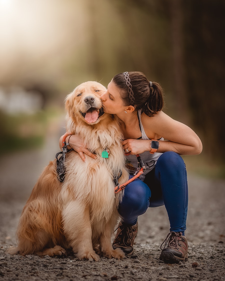 A happy dog owner affectionately greeting their dog